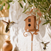 Vogelhuisje huisje van metaal op met paal