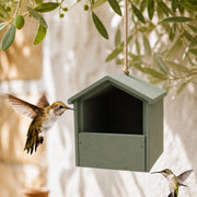 Vogelhuisje van beton met open voorkant