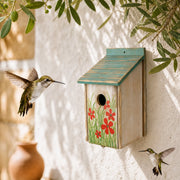 Vogelhuisje geverfd met bloemen
