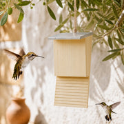 Vogelhuisje bat van hout met zinken dak