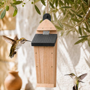 Vogelhuisje taps van hout met ingangen zij