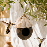 Vogelhuisje van kokosnoot