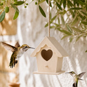 Houten vogelhuisje licht met ingang hart